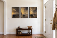 The Crossings framed prints hung in a front entry