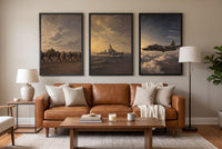 By Land, Sea, and Air framed prints hung above a sofa in a living room