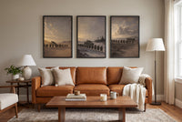 The Three Theaters framed prints hung above a sofa in a living room