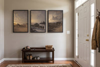 The Three Theaters framed prints hung in a front entry