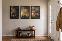 The Revolution at Sea framed prints hung in a front entry