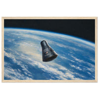 Framed panoramic art print of the Friendship 7 capsule orbiting Earth against the black of space, in a solid wood frame.