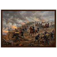 Framed art print of a Civil War artillery line firing amid smoke, cavalry and flags beyond, in a solid wood frame.