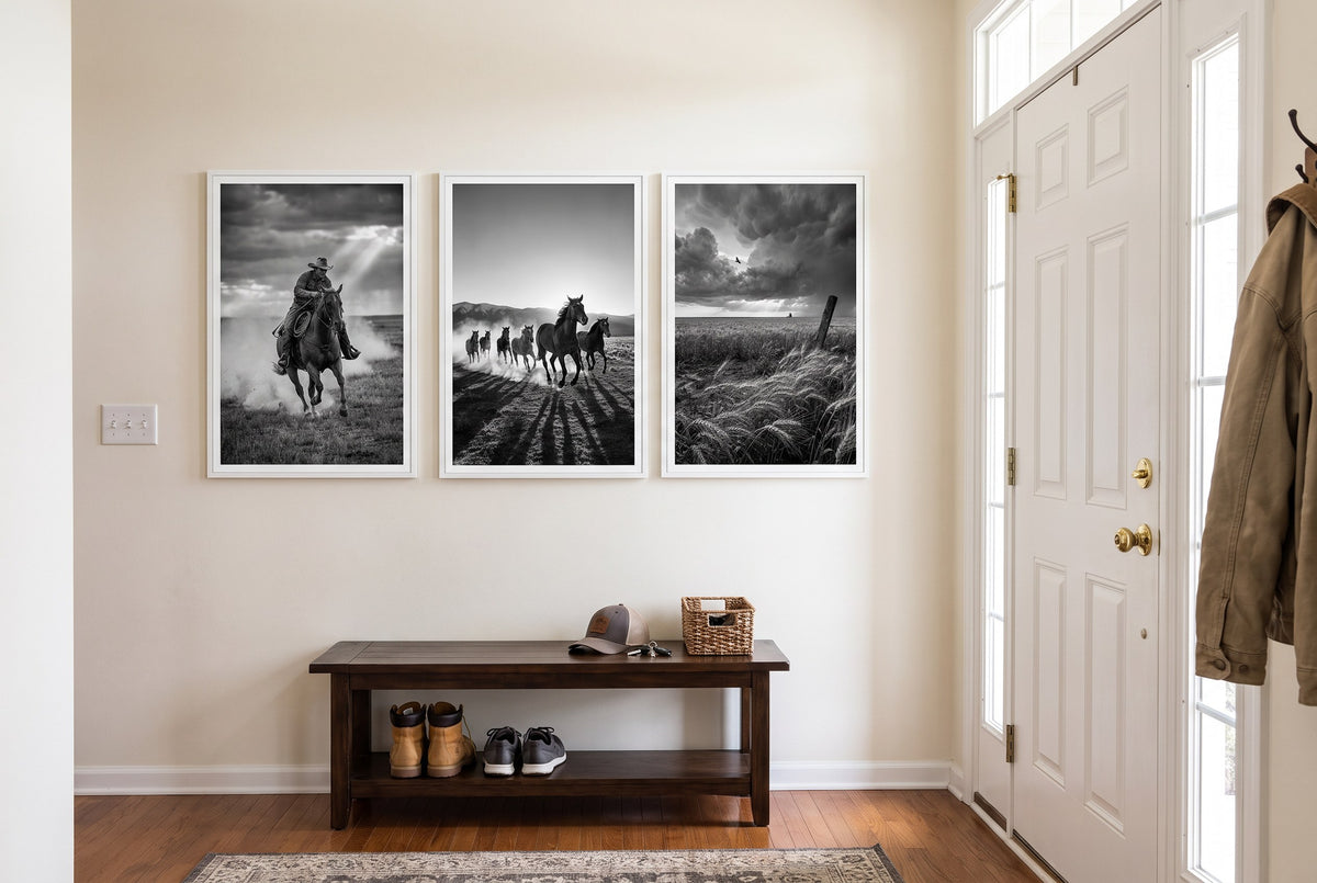 Wranglers framed prints hung in a front entry