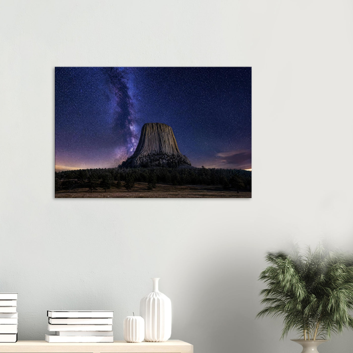 Canvas print of Devils Tower under the Milky Way — room view, ready to hang.