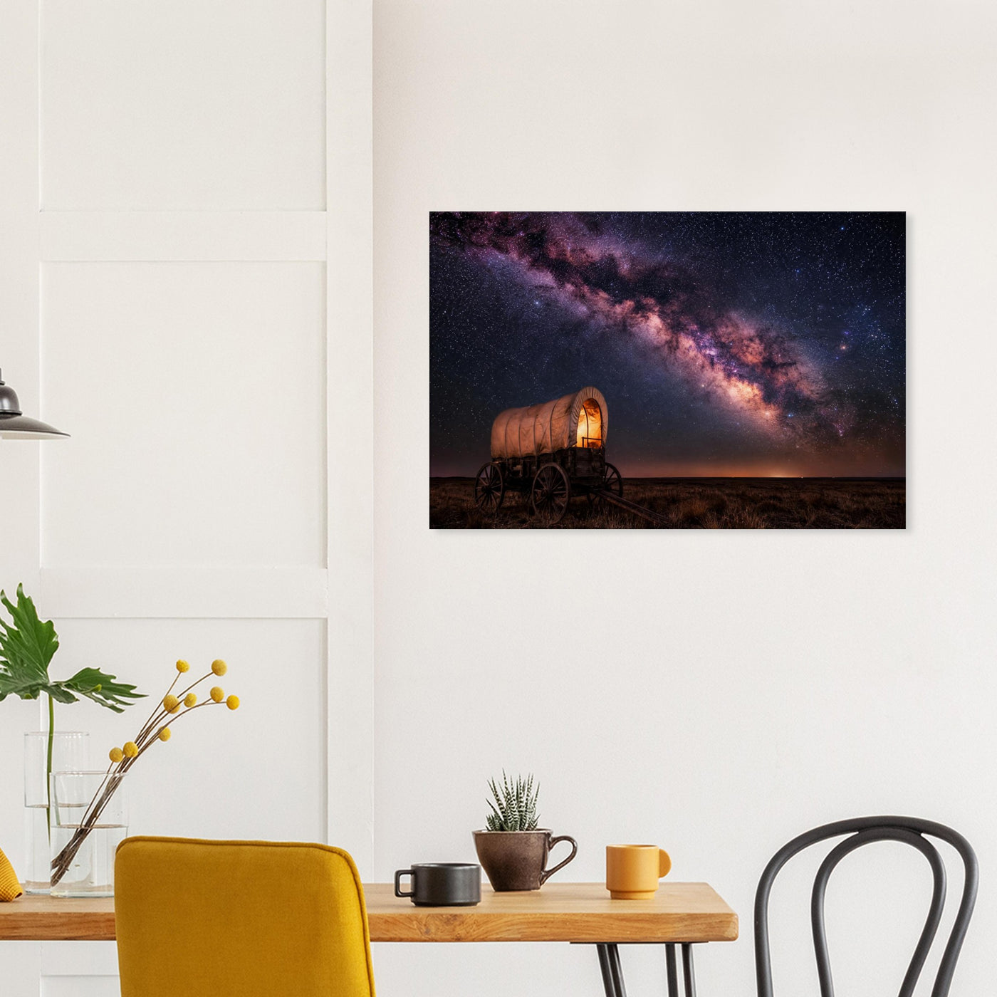 Canvas print of a wagon trail under the Milky Way — room view, ready to hang.