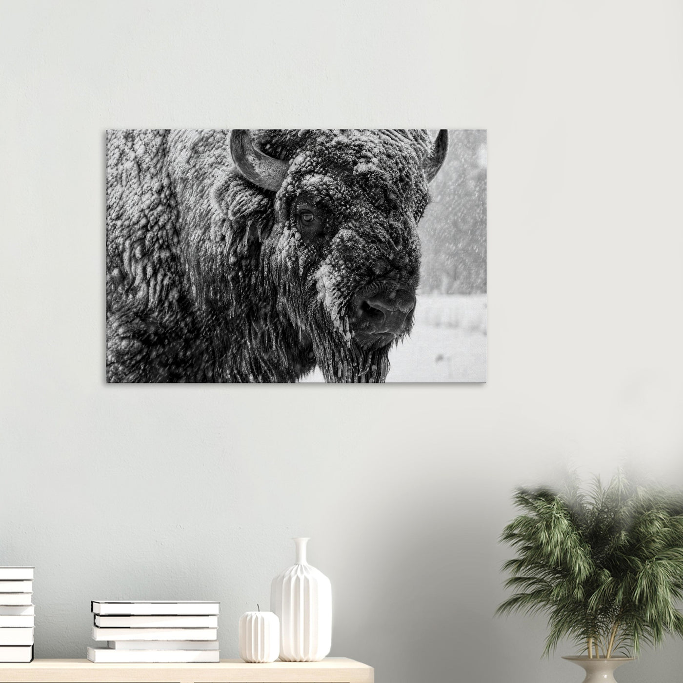 Canvas print of an American bison in winter snow — room view, ready to hang.