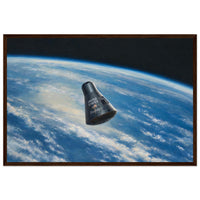 Framed panoramic art print of the Friendship 7 capsule orbiting Earth against the black of space, in a solid wood frame.