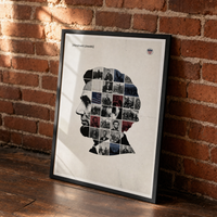 Abraham Lincoln framed print, matte black frame, leaning against an exposed brick wall.