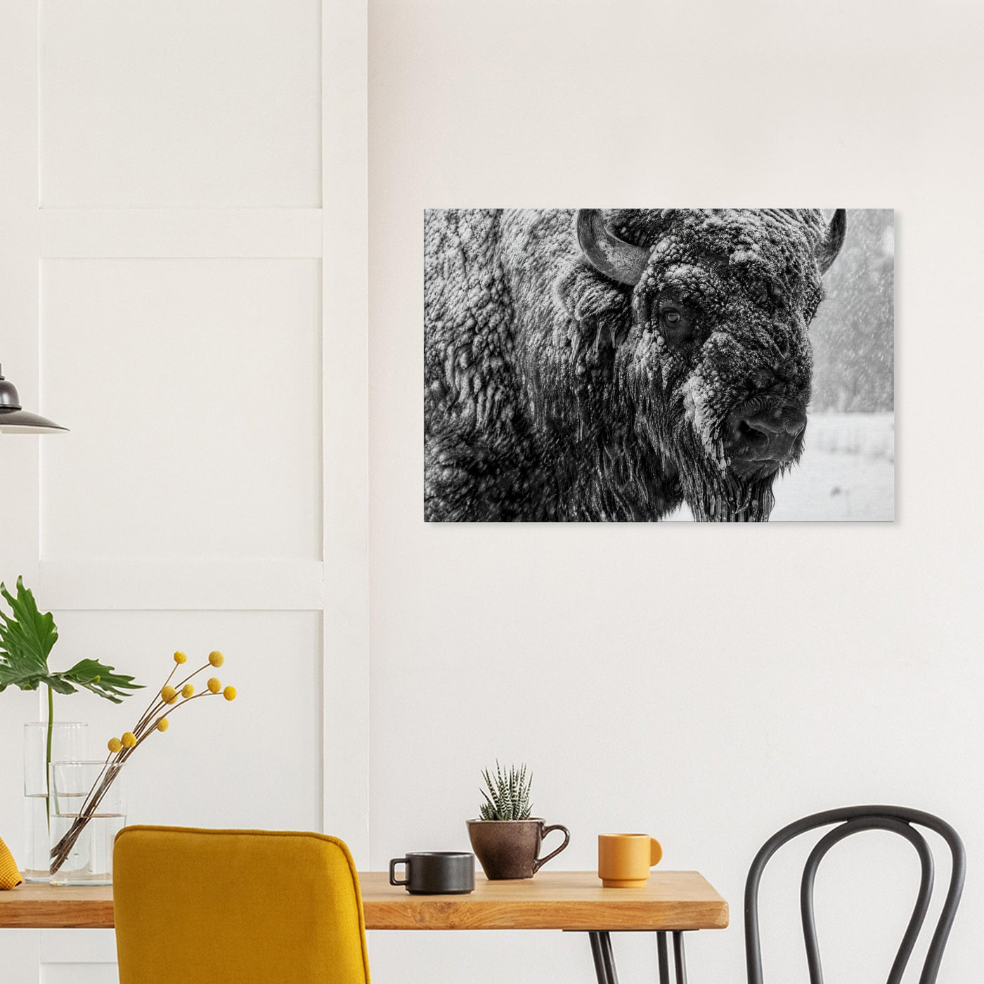 Canvas print of an American bison in winter snow — room view, ready to hang.