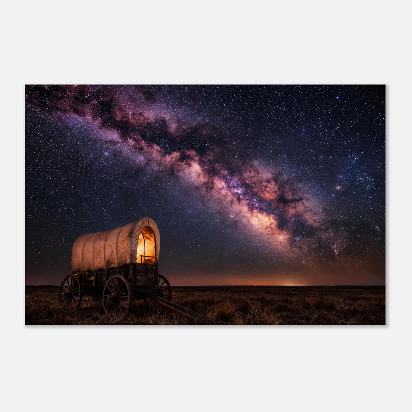 Canvas print of a wagon trail under the Milky Way — room view, ready to hang.