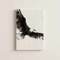 Ink Wing – bald eagle in flight painted in black ink on warm paper, patriotic canvas wall art on a linen white wall