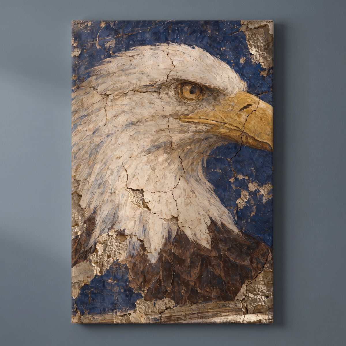 The Eagle Fresco – bald eagle in profile painted as a cracked plaster fresco, patriotic canvas wall art on a slate grey wall