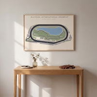 Daytona International Speedway framed print hanging in a home interior