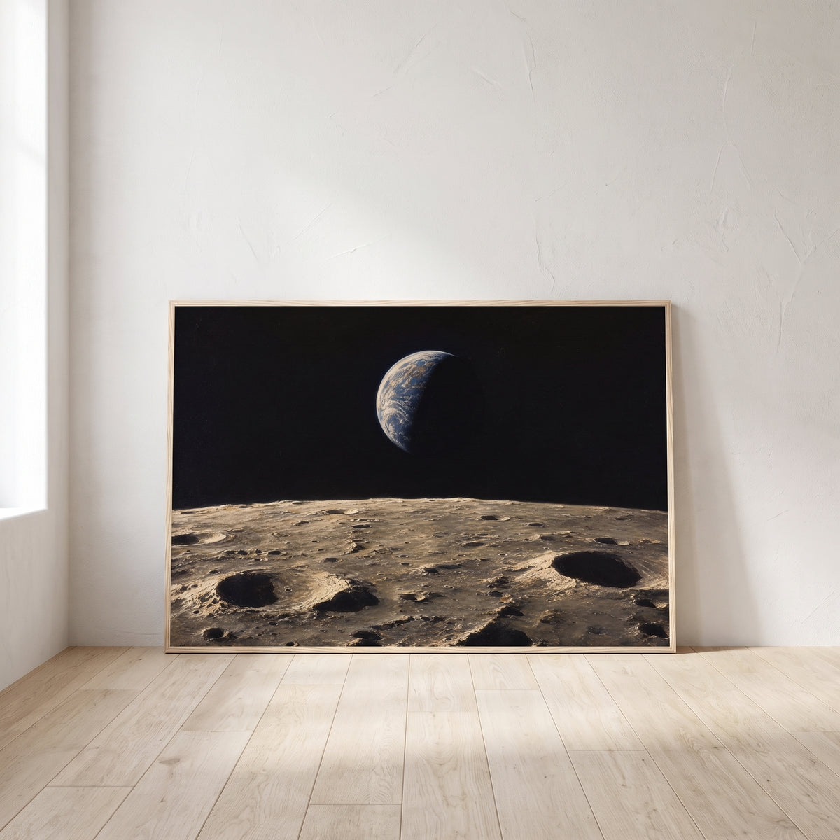 Earthrise framed print leaning against a wall