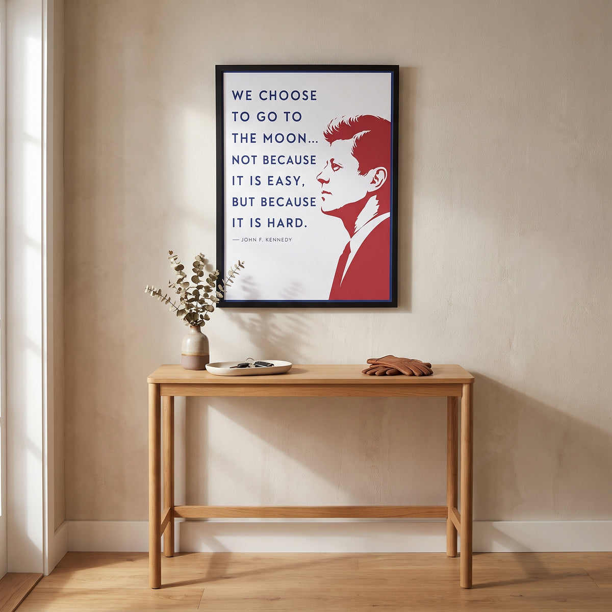 John F. Kennedy — We Choose to Go to the Moon framed print hanging in a home interior