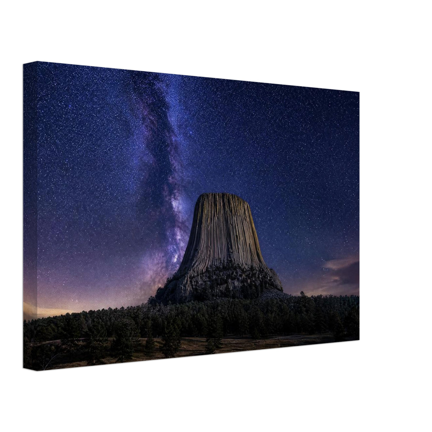 Canvas print of Devils Tower under the Milky Way — room view, ready to hang.