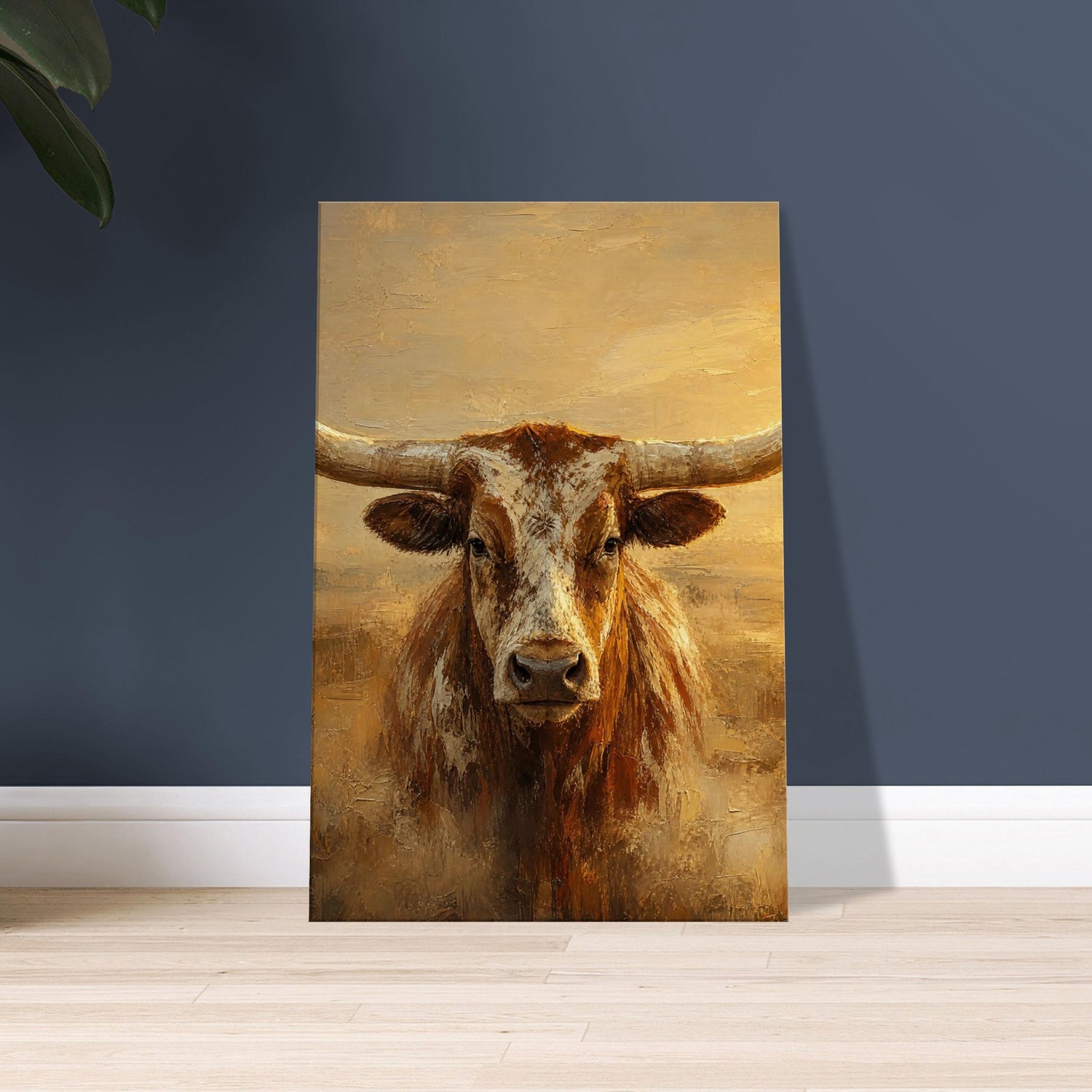 The Longhorn gallery-wrapped canvas leaning against a navy wall on a wood floor