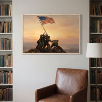 Dawn Over Mount Suribachi framed print on a library wall between bookshelves