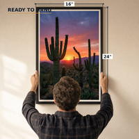 Desert Gold framed print, matte black frame, 16×24″, held to the wall — ready to hang out of the box.