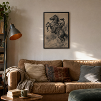 The Rodeo Rider framed print above a sofa in a lived-in living room