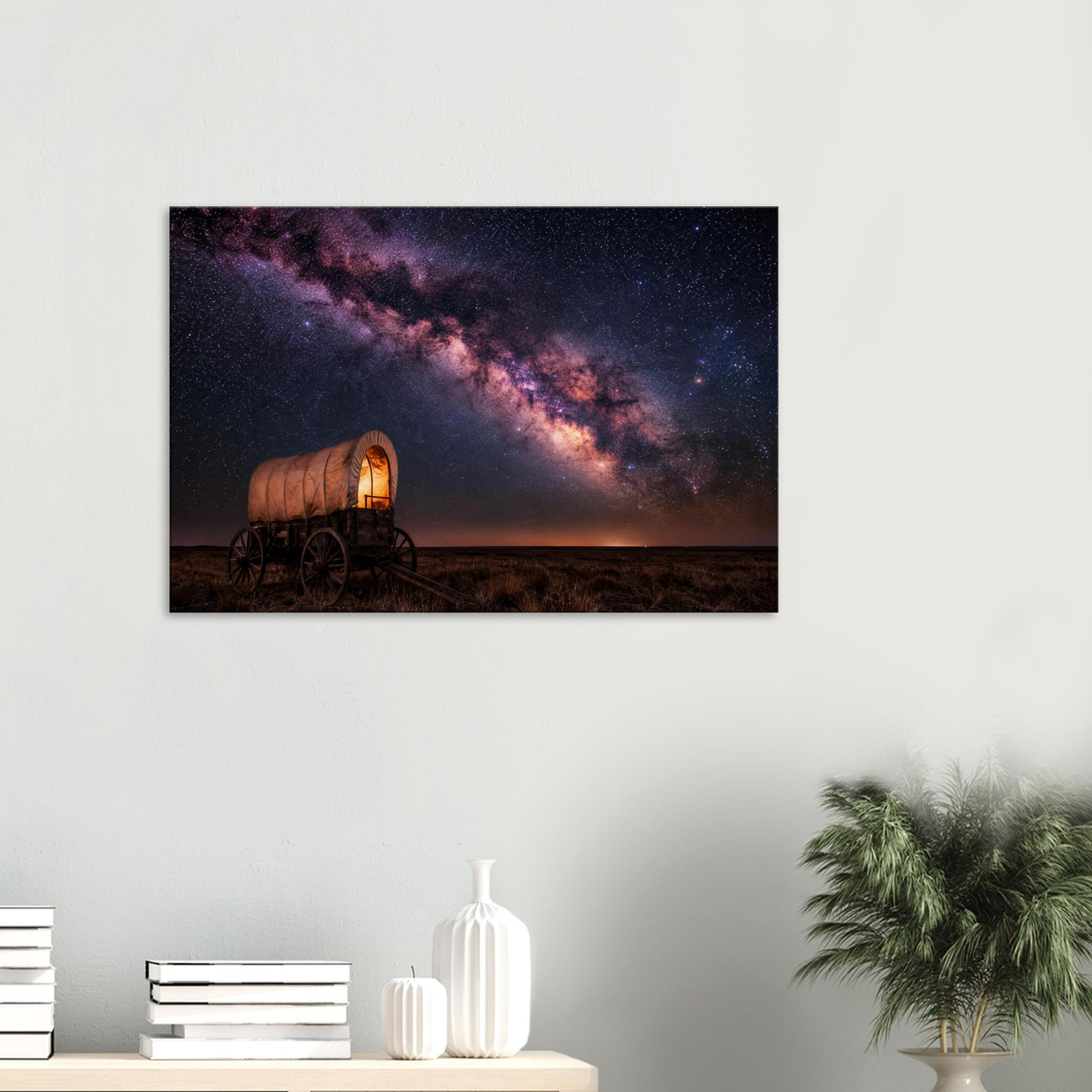 Canvas print of a wagon trail under the Milky Way — room view, ready to hang.