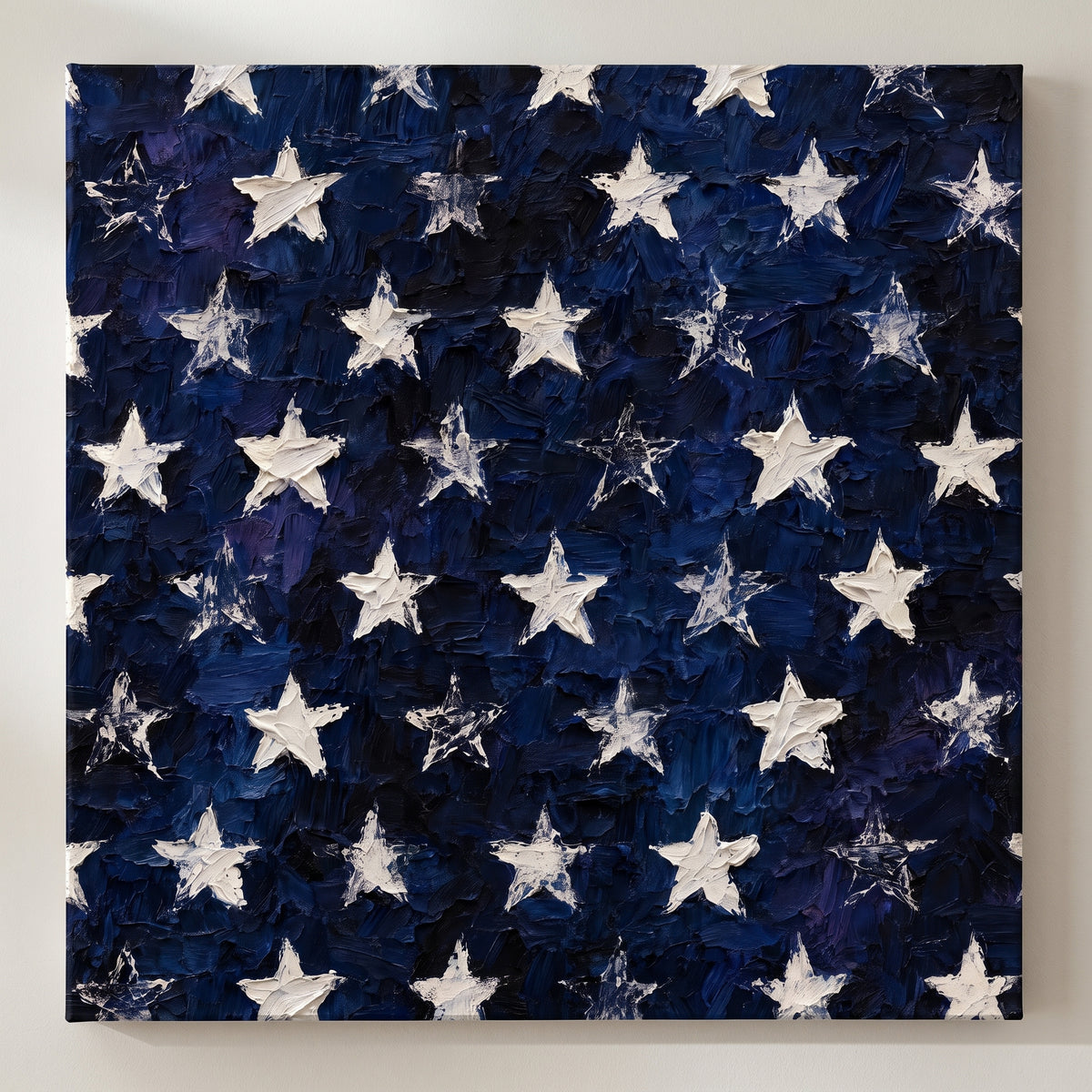 Fifty Stars – fifty white stars on a midnight navy ground, patriotic canvas wall art on a linen white wall