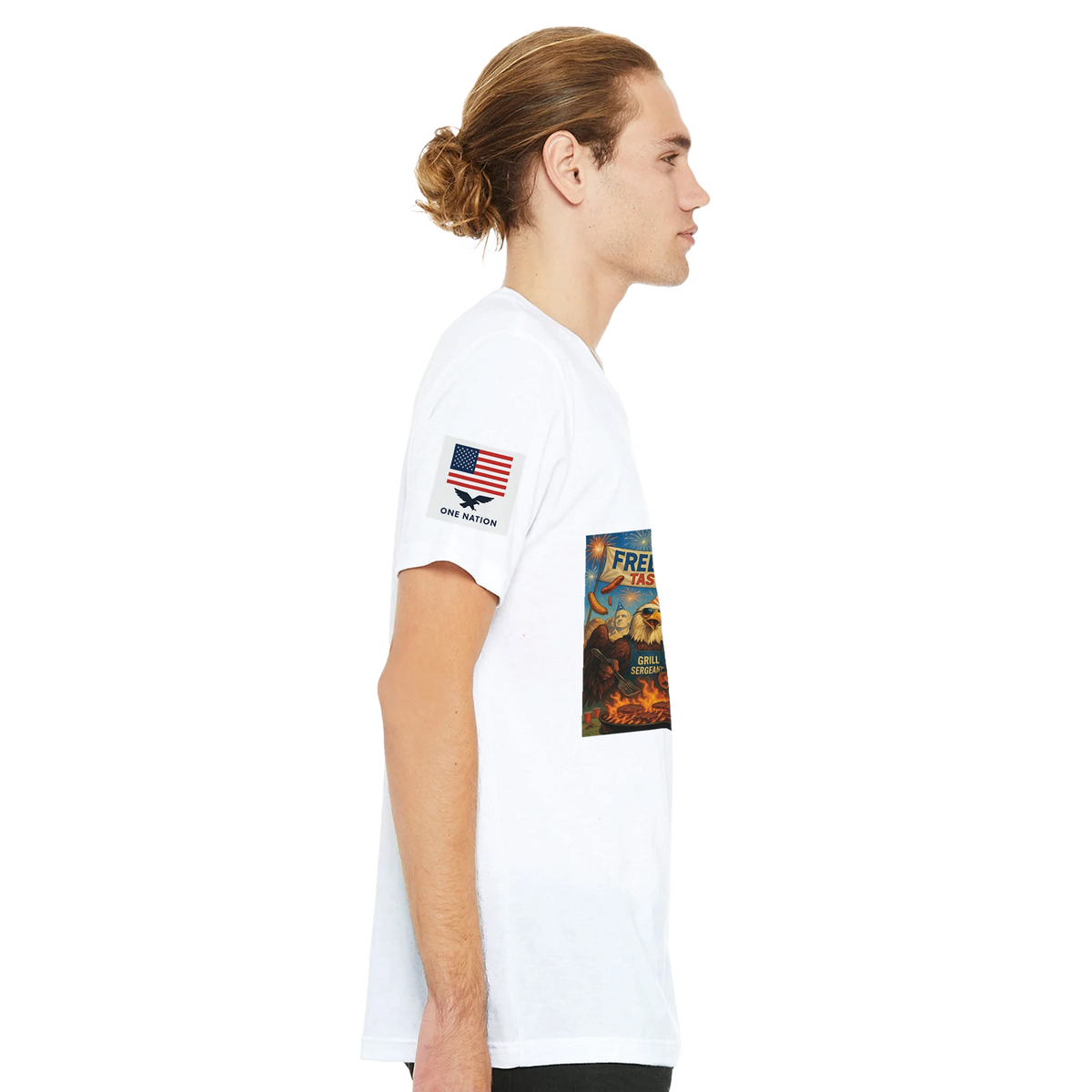 Freedom Never Tasted so Good - BBQ T-Shirt — T-shirt of a white t-shirt with a shirtless colonial-wigged man and bald eagle grilling under fireworks