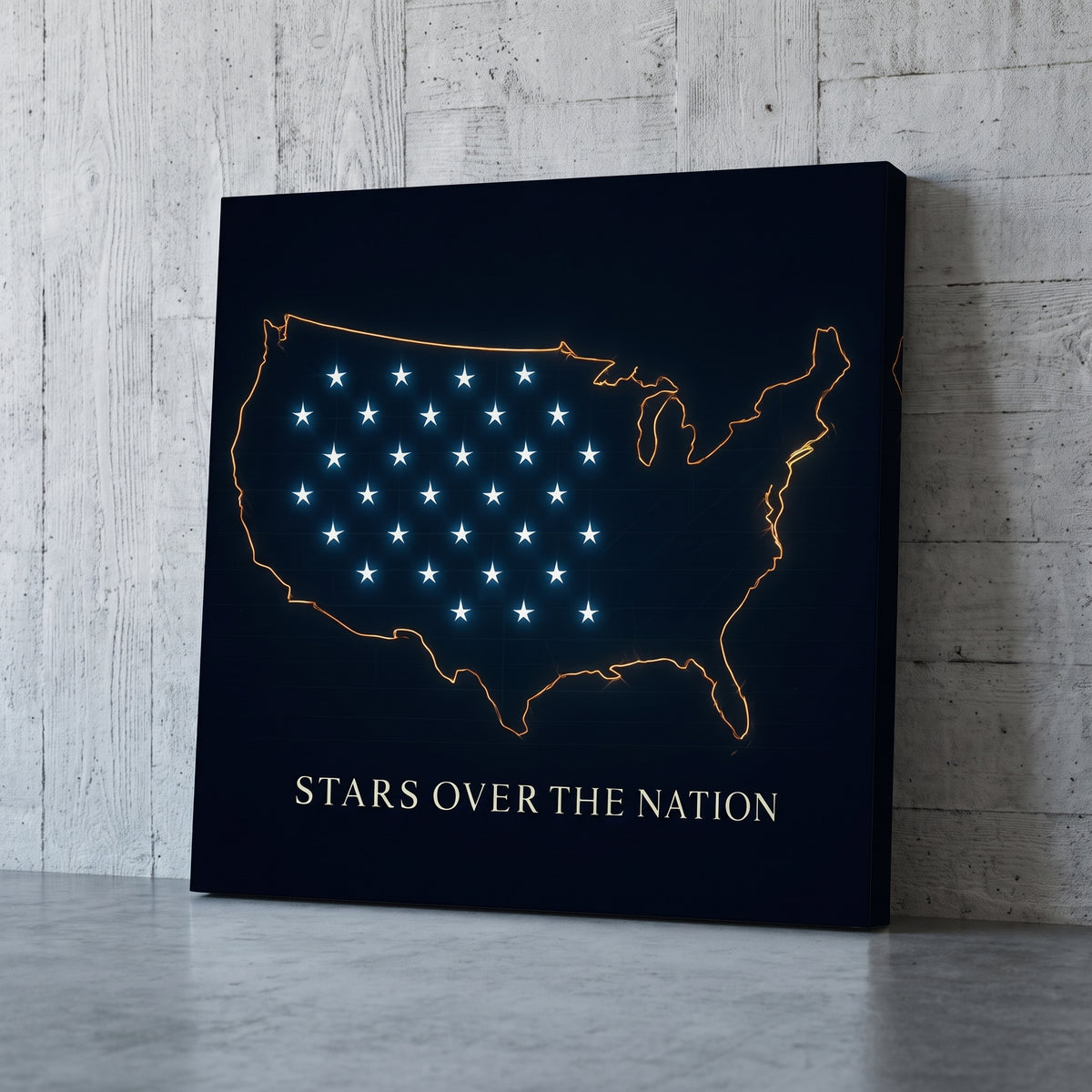 Stars over the Nation – gold outline map of the United States with blue stars on navy, patriotic canvas wall art leaning against a concrete wall