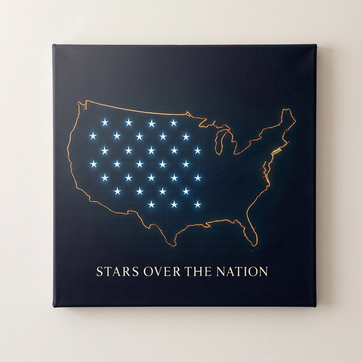 Stars over the Nation – gold outline map of the United States with blue stars on navy, patriotic canvas wall art on a linen white wall