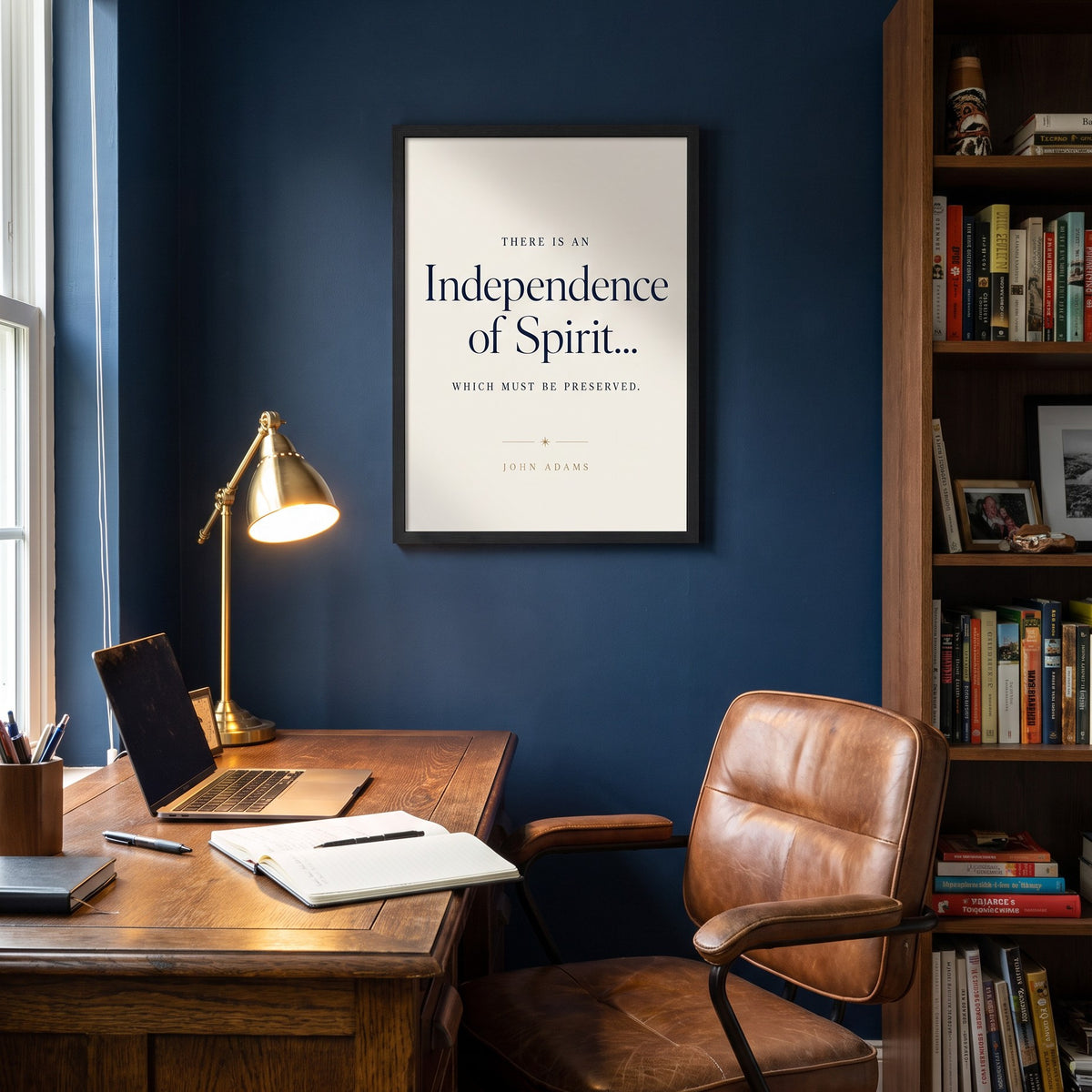 Independence framed print in a navy home office