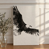 Ink Wing canvas leaning against a white paneled wall