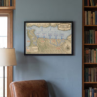 Operation Overlord — Map framed print on a library wall between bookshelves