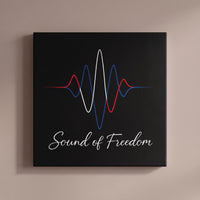 Sound of Freedom – red, white and blue sound wave over script lettering on black, patriotic canvas wall art on a taupe wall