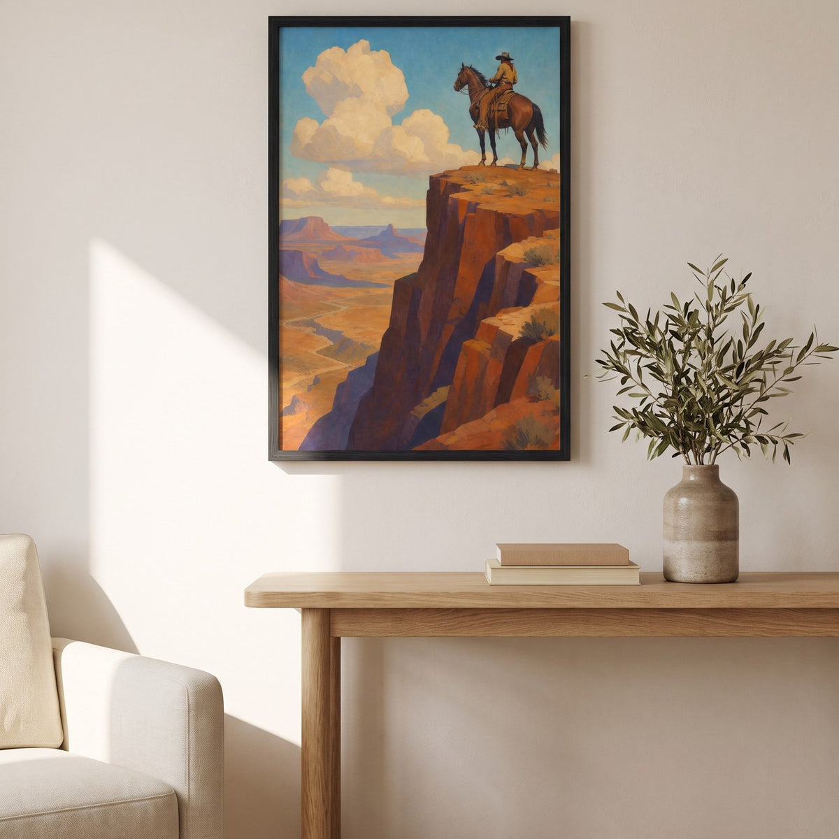 Rider on the Range framed print above a wooden console table