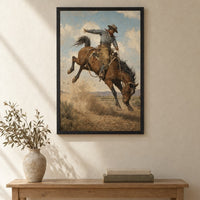 The Bronco Buster framed print above a wooden console table