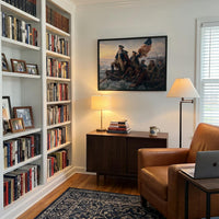 Washington Crossing the Delaware framed print in a study with bookshelves