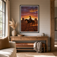 Into the Dusk framed print, matte black frame, 24×36″, shown above an oak console in a modern farmhouse room.